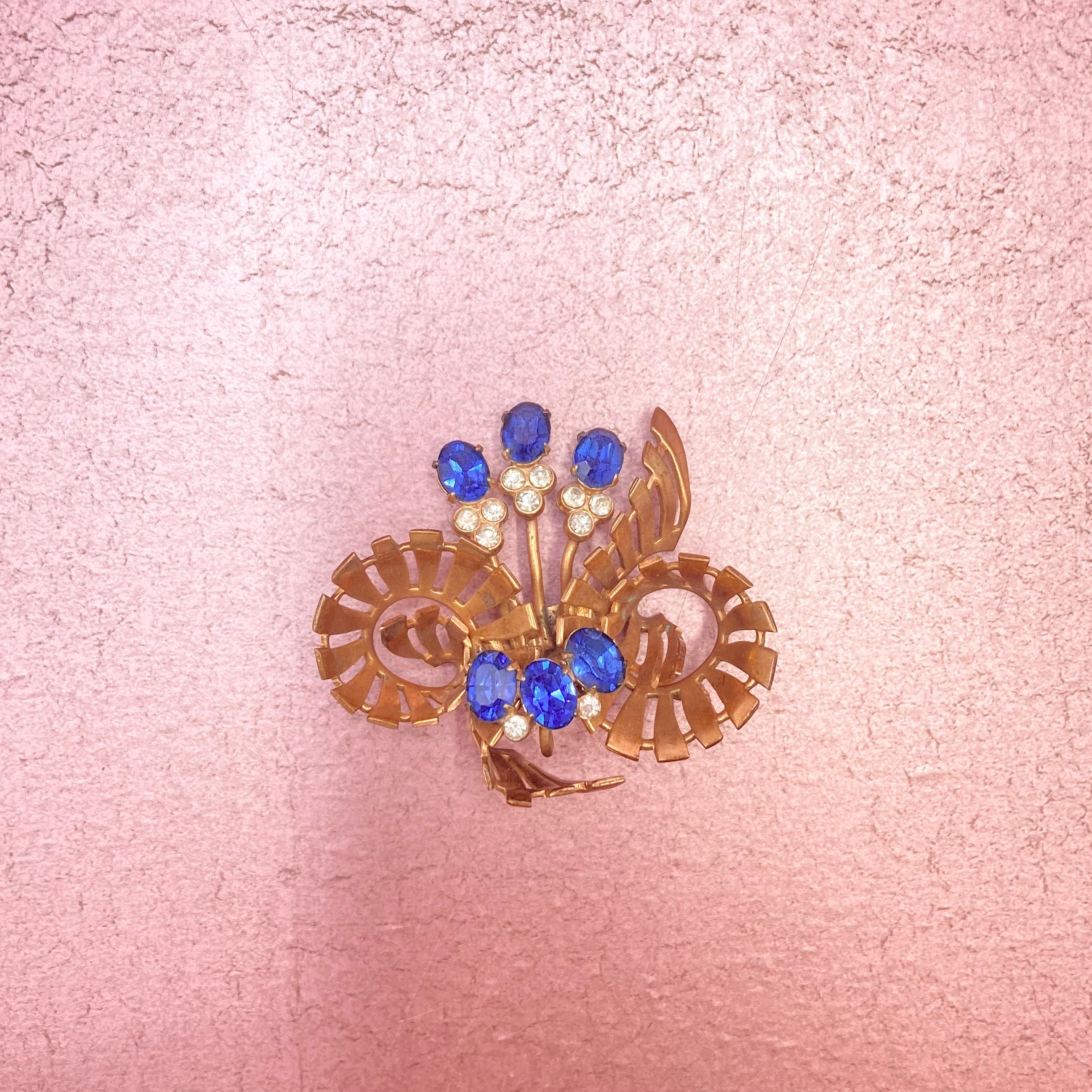Gold Scroll Pin with Blue and White Stones
